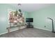 Inviting bedroom with a TV and a plant stand to add some color at 12425 N 127Th Dr, El Mirage, AZ 85335