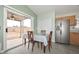 Cozy dining area with convenient access to the outdoor space at 12425 N 127Th Dr, El Mirage, AZ 85335