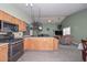 Spacious kitchen that flows into the living room, great for entertaining at 12425 N 127Th Dr, El Mirage, AZ 85335