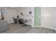 Dedicated home office with two desks and ample shelving, perfect for remote work or study at 12425 N 127Th Dr, El Mirage, AZ 85335