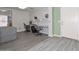 Home office featuring new floors, built-in shelving, and natural light, ideal for a productive workspace at 12425 N 127Th Dr, El Mirage, AZ 85335