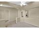 Open-concept bedroom space offers an airy feel and transitions into tiled hallway at 12607 W Highland Ave, Litchfield Park, AZ 85340