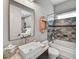This modern bathroom boasts a unique shower and tub combination, along with a stylish vanity at 12970 W Kokopelli Dr, Peoria, AZ 85383
