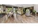 Open concept living area with wood-look tile, stone accents and lots of natural light at 12970 W Kokopelli Dr, Peoria, AZ 85383