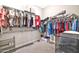 Walk-in closet with clothing racks and shelving offers great storage capacity at 17165 W Piperton St # 181, Surprise, AZ 85388