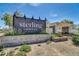 Elegant community entrance sign at Sterling Grove Golf and Country Club, with beautiful landscaping at 17165 W Piperton St # 181, Surprise, AZ 85388