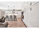 Elegant kitchen with white cabinets, stainless steel appliances, and a spacious breakfast bar at 17165 W Piperton St # 181, Surprise, AZ 85388