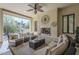 Relaxing outdoor patio with cozy seating and a fireplace, perfect for enjoying the outdoors at 1775 E Tangelo Pl, Queen Creek, AZ 85140