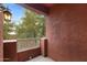 Cozy balcony with a view of lush greenery and natural light at 1920 E Bell Rd # 1019, Phoenix, AZ 85022