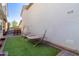 Backyard featuring a comfortable hammock, an elegant outdoor swing, and a relaxing hot tub for outdoor leisure at 20728 W Legend Trl, Buckeye, AZ 85396