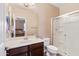 Bathroom vanity with a sink, toilet and glass shower with chrome features at 20728 W Legend Trl, Buckeye, AZ 85396