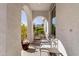 Inviting front porch featuring comfortable seating with a view of the outdoors at 20728 W Legend Trl, Buckeye, AZ 85396