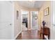 Hallway leading to other rooms in the house with white trim at 20728 W Legend Trl, Buckeye, AZ 85396