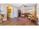 Cozy living room featuring a fireplace, leather seating, and decorative accents at 20728 W Legend Trl, Buckeye, AZ 85396