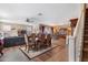 Spacious living room with open floor plan combining dining area, offering ample space and natural light at 20728 W Legend Trl, Buckeye, AZ 85396