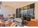 Covered patio featuring lounge furniture, and sliding glass doors leading inside at 20728 W Legend Trl, Buckeye, AZ 85396