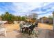 This backyard has a nice patio with seating and foliage on the outskirts at 2315 N 12Th St, Phoenix, AZ 85006