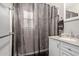 This bathroom features a vanity with granite countertops and a mirror at 2315 N 12Th St, Phoenix, AZ 85006