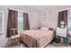 Cozy bedroom with a comfortable bed and neutral tones at 2315 N 12Th St, Phoenix, AZ 85006
