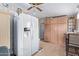 Bright kitchen featuring a large refrigerator and wooden cabinets at 2315 N 12Th St, Phoenix, AZ 85006