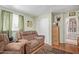 This living room has laminate floors and large windows for natural light at 2315 N 12Th St, Phoenix, AZ 85006