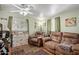 This cozy living room has a ceiling fan and comfortable seating to sit and relax at 2315 N 12Th St, Phoenix, AZ 85006