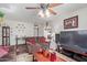 Comfortable living room featuring vintage decor, textured walls, and hardwood floors at 2315 N 12Th St, Phoenix, AZ 85006