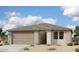 Charming one-story home features a neutral color palette and a two-car garage at 2384 E Spur Dr, San Tan Valley, AZ 85140