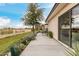 An inviting back patio offers a serene outdoor space with comfortable seating and lush landscaping at 2509 N 61St Way, Scottsdale, AZ 85257