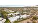 Aerial view of homes in community with desert landscaping; mountain range in the background at 2509 N 61St Way, Scottsdale, AZ 85257