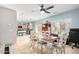 Open-concept dining area next to the kitchen, bathed in natural light at 26111 W Yukon Dr, Buckeye, AZ 85396