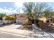 Charming single-Gathering home featuring a well-maintained yard and a two-car garage at 26111 W Yukon Dr, Buckeye, AZ 85396