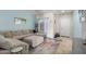 Comfortable living room with a large sectional sofa and stylish rug at 26111 W Yukon Dr, Buckeye, AZ 85396