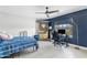 Comfortable bedroom with a baseball theme, featuring a desk and a ceiling fan at 2733 E Virginia St, Gilbert, AZ 85296