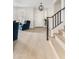 Spacious foyer with hardwood floors, a staircase, and ample natural light at 2733 E Virginia St, Gilbert, AZ 85296