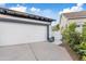 Spacious two-car garage with a clean driveway, providing ample parking and storage at 2733 E Virginia St, Gilbert, AZ 85296