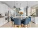 Bright, open kitchen with a large island, modern appliances, and custom cabinetry at 2733 E Virginia St, Gilbert, AZ 85296