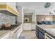 Modern kitchen with stainless steel appliances, granite countertops, and an open layout at 2733 E Virginia St, Gilbert, AZ 85296