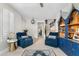 Bright and inviting living room featuring stylish furniture and views of the staircase at 2733 E Virginia St, Gilbert, AZ 85296