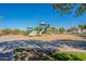 Vibrant playground featuring multiple slides and play structures, perfect for Gathering fun and recreation at 2733 E Virginia St, Gilbert, AZ 85296