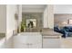 Modern wet bar area with marble countertops and stylish farmhouse sink at 2733 E Virginia St, Gilbert, AZ 85296