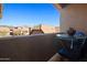 Balcony with a table and chairs offering views of the community at 3441 W Florimond Rd, Phoenix, AZ 85086