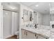 Bathroom featuring granite countertops, modern fixtures, and a shower with white tile at 4141 N 31St St # 405, Phoenix, AZ 85016