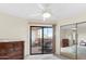 Bright bedroom with mirrored closet and balcony access at 4141 N 31St St # 405, Phoenix, AZ 85016