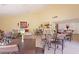 Open community room with tables, chairs, and an open kitchen area at 4141 N 31St St # 405, Phoenix, AZ 85016