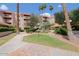 Well-manicured community courtyard with lush landscaping and walking paths at 4141 N 31St St # 405, Phoenix, AZ 85016
