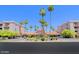 Beautiful condo community featuring mature landscaping, shade trees, and a tiled roof at 4141 N 31St St # 405, Phoenix, AZ 85016