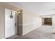 Well-maintained hallway with neutral colors and a welcoming entrance door adorned with a wreath at 4141 N 31St St # 405, Phoenix, AZ 85016