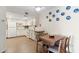 Charming kitchen with white cabinets, modern appliances, and a cozy breakfast nook at 4141 N 31St St # 405, Phoenix, AZ 85016