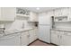 Bright kitchen featuring white cabinetry, stainless steel appliances, and granite countertops at 4141 N 31St St # 405, Phoenix, AZ 85016